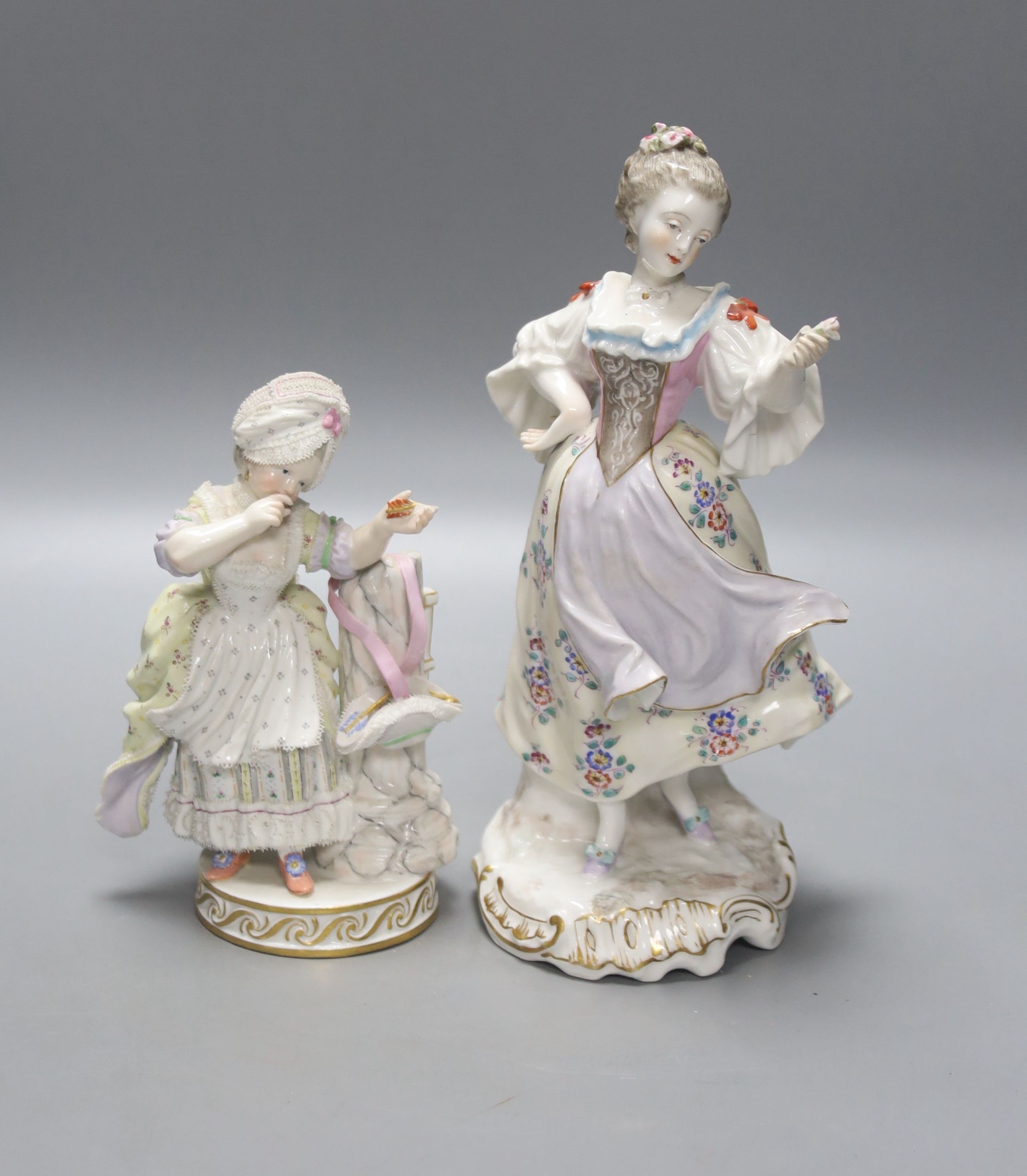 A Meissen figurine, and a continental porcelain figure of a lady with pseudo Derby Mark, tallest 22.5cm